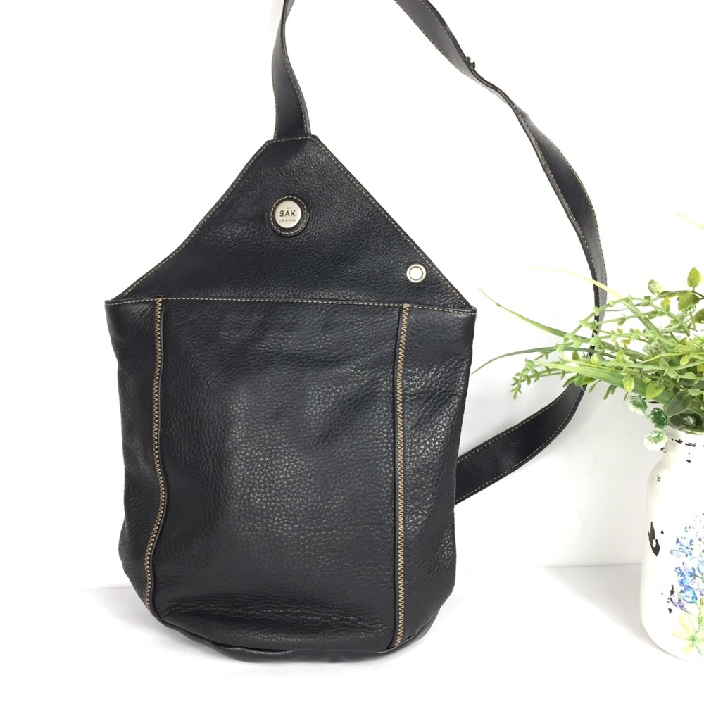 The SAK original pebble leather sling backpack